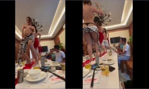 Nhảy khỏa thân thoát y trên bàn tiệc